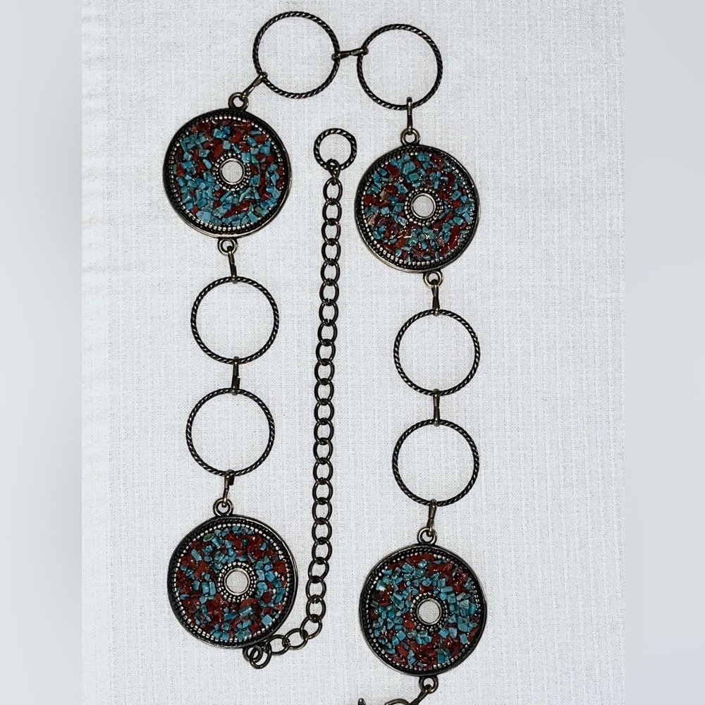 Turquoise and rust concho belt.